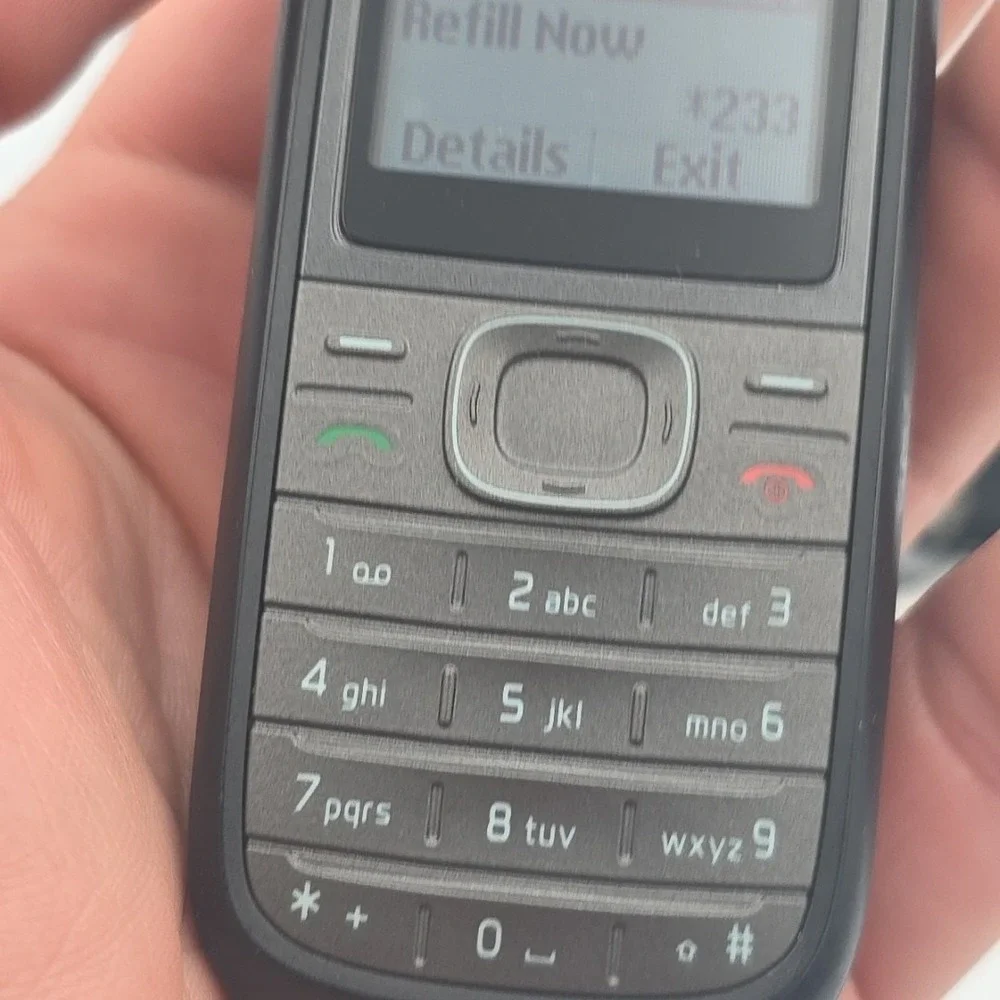 Nokia Cell Phone Model 1208 T-Mobile With Charger And Ear Buds